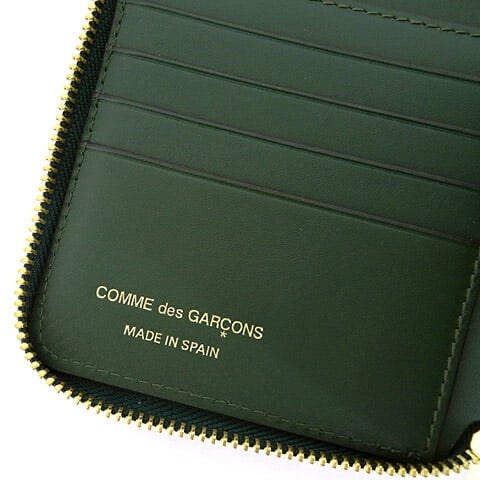 コムデギャルソンの二つ折り財布緑色の内側ロゴ