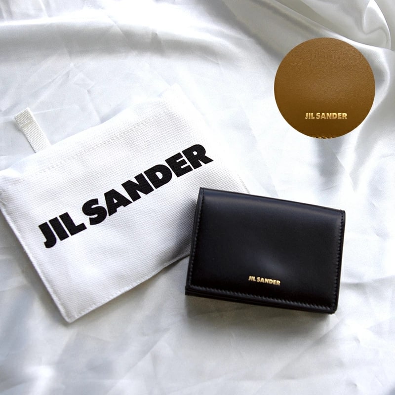 ジルサンダーの財布とブランドロゴがプリントされた保存袋